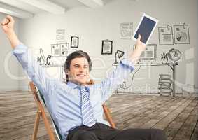 Happy businessman holding tablet PC while celebrating victory against graphics