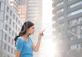 Woman pointing at tall buildings flare