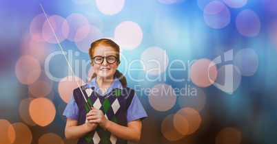 Portrait of happy girl holding stick over bokeh