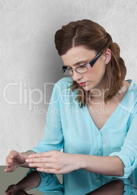 Businesswoman with invisible product in office