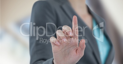 Midsection of businesswoman touching futuristic screen