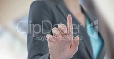 Midsection of businesswoman touching futuristic screen