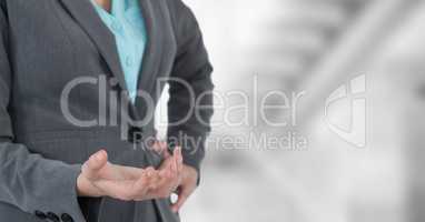 Midsection of businesswoman offering hand