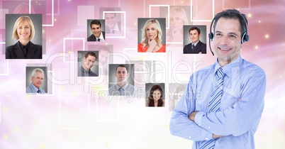 Smiling businessman wearing headphones with portrait graphics in background