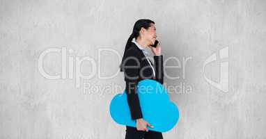 Businesswoman using smart phone while carrying cloud shape