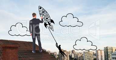 Rear view of businessman on roof drawing rocket in midair