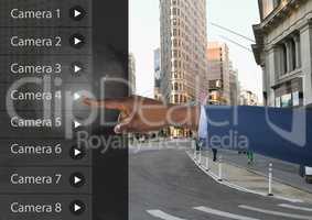 Hand Touching Security Camera App Interface street