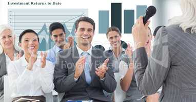 Business people applauding while executive giving speech