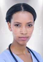 Close up of female doctor against white background
