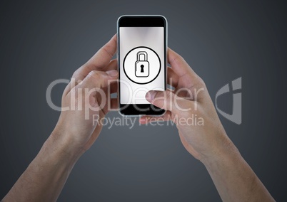 Close up of hands holding a smartphone with padlock on screen