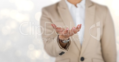 Midsection of businessman gesturing