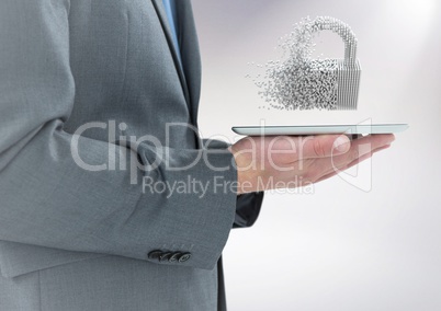 Business man mid section with tablet and 3D lock graphic