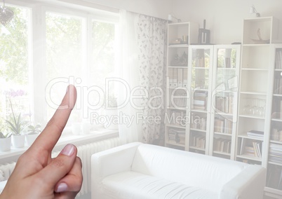 Hand pointing in  air of home living room