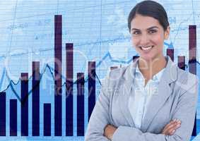 Businesswoman with arms crossed against graphs