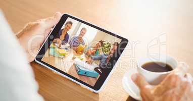 Hand video conferencing with team on tablet PC