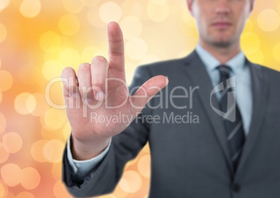 Midsection of businessman touching screen