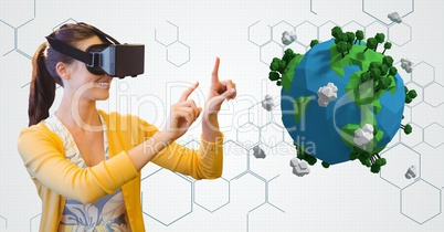 Woman wearing VR glasses while gesturing by low poly earth