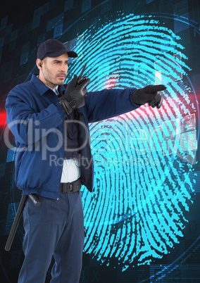Security guard using radio while pointing away against finger print on screen