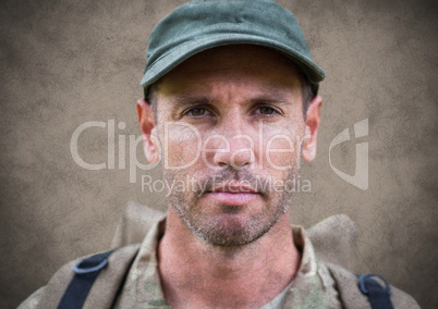 Soldier face with grunge overlay against brown background