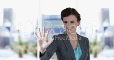 Happy businesswoman gesturing outdoors