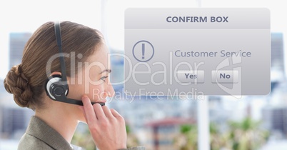 Customer service representative using headset by dialog box