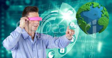 Businessman wearing VR glasses while touching low poly earth