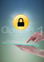 Hands with glass device and yellow lock graphic with flare against blue green background