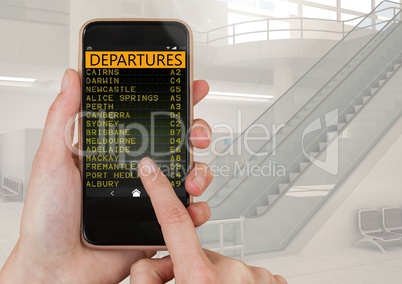 Hand touching mobile phone and a Flight Departures Airport App Interface