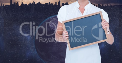 Midsection of businesswoman holding blank slate
