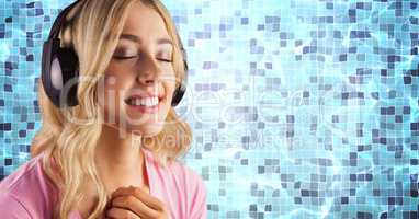 Woman listening to songs against swimming pool