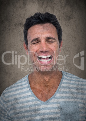 Man crying against brown background with grunge overlay