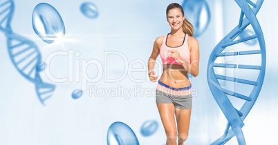 Fit young woman running by DNA structure