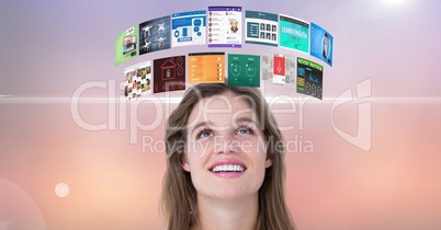Happy woman looking at flying panels over head