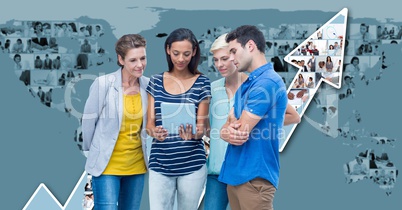 Casual business people using laptop with map and arrow graphics in background