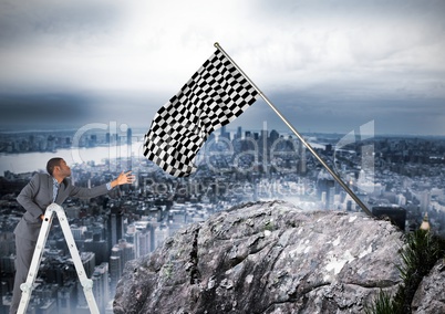 Businessman with leader taking the checker flag that is in a rock. city background