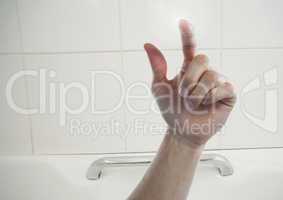 Hand Touching  air out of bath