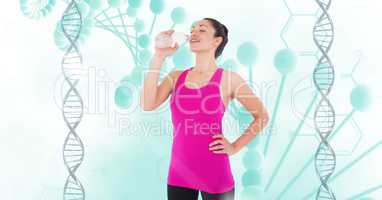 Fit woman drinking water against DNA structures