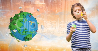 Boy playing with soap bubbles by low poly earth