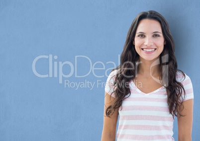 Portrait of happy female hipster against blue background