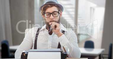 Hippie businessman smoking pipe while using typewriter