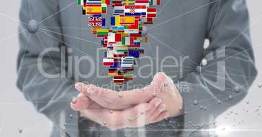 Midsection of businessman with various flags