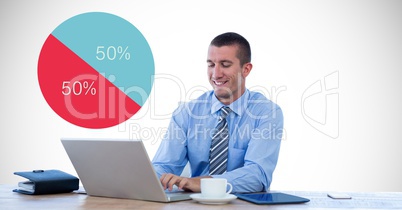 Businessman using laptop by data