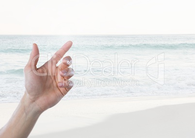 Hand touching  air with  sea horizon