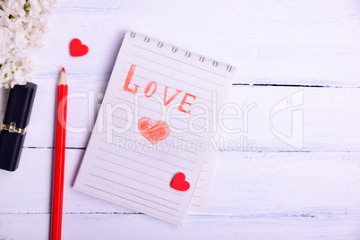 Paper notepad with an inscription love