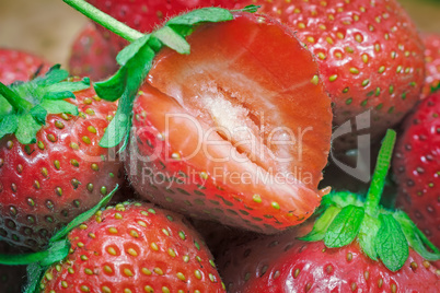 Cut a ripe strawberry to the major plan.