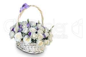 Basket with beautiful roses on a white background.
