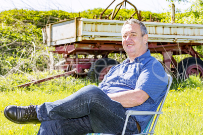 Man enjoys the leisure time in a flower meadow