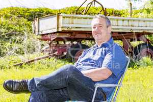 Man enjoys the leisure time in a flower meadow