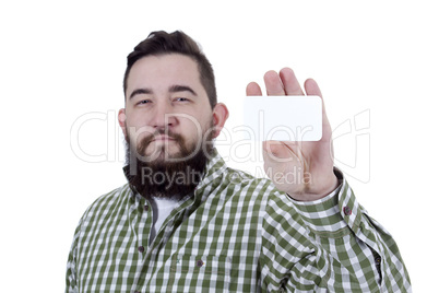 Young bearded man with a business card in his hands