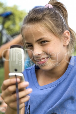 Happy girl while with mobile telephone